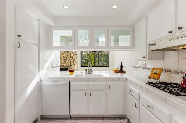 5987 Peacock Ridge Rd Unit 101, Rancho Palos Verdes, CA 90275 - kitchen featuring white appliances, a sink, tile countertops, and backsplash