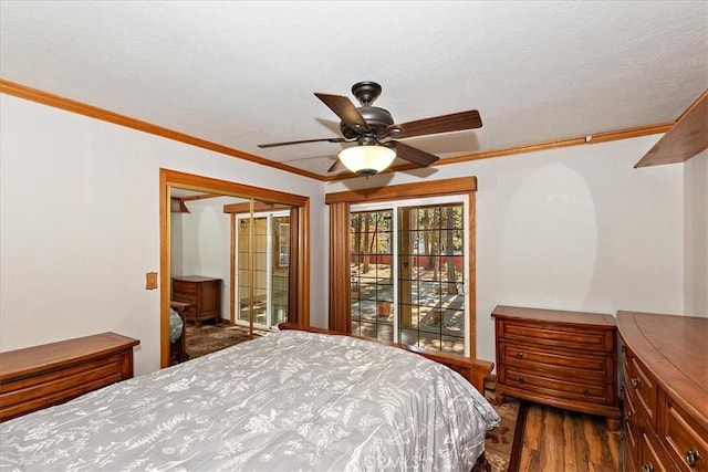 bedroom featuring hardwood / wood-style flooring, ceiling fan, and crown molding