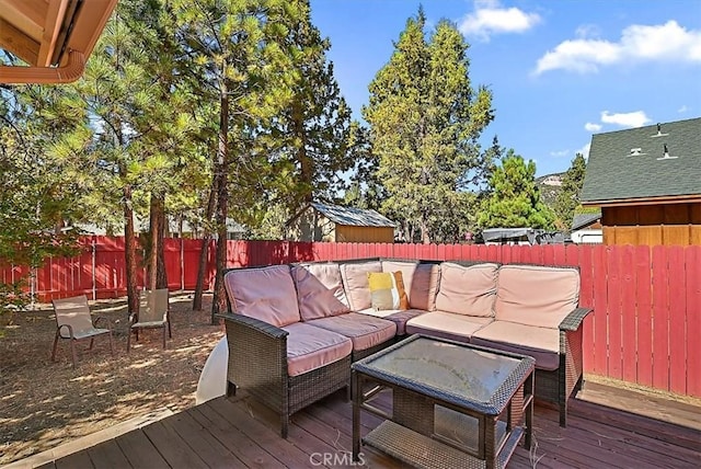 wooden deck with an outdoor hangout area