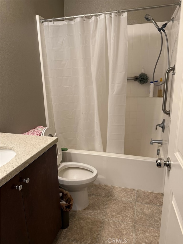 full bathroom with tile patterned floors, vanity, toilet, and shower / tub combo with curtain