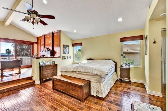 bedroom with dark hardwood / wood-style flooring, lofted ceiling with beams, and ceiling fan