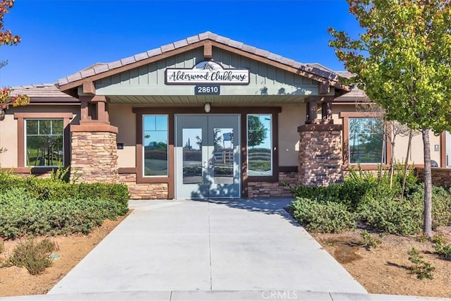 entrance to property featuring french doors