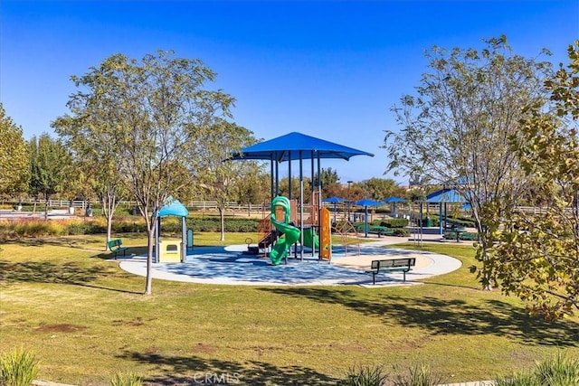 view of jungle gym featuring a yard