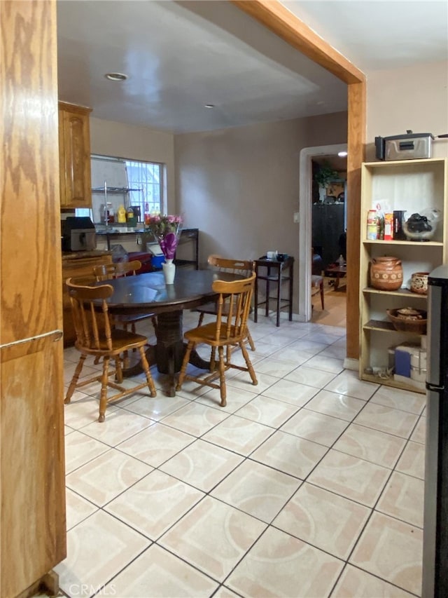 dining space with light tile patterned flooring