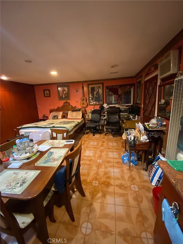 dining area with light tile patterned flooring and a wall mounted air conditioner