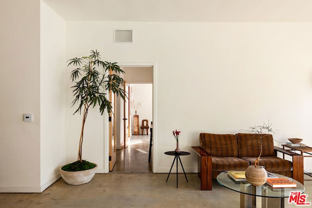 sitting room with concrete floors