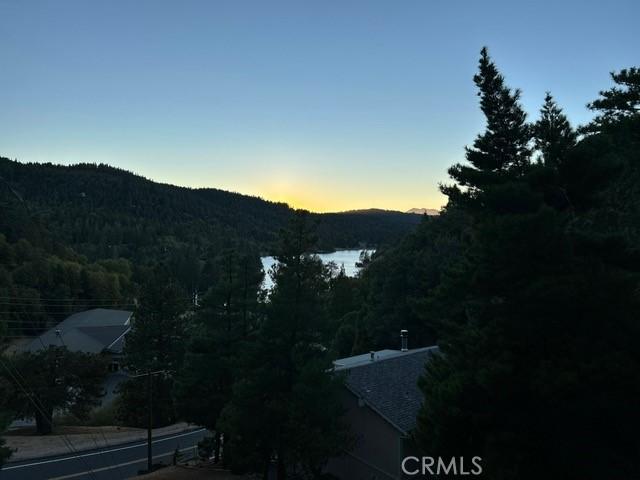 494 Delle Dr, Crestline, CA 92325 - view of mountain backdrop with a heavily wooded area