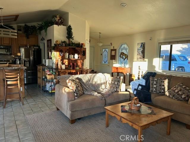 living room with light tile patterned floors