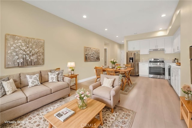 living room featuring light wood-type flooring