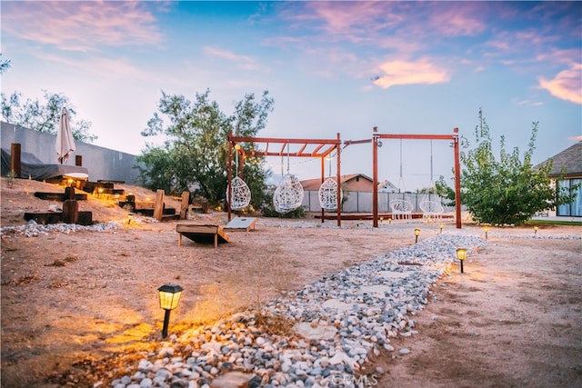 view of playground at dusk