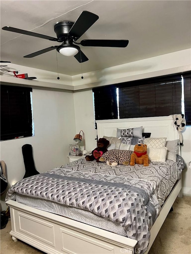 bedroom featuring carpet floors and ceiling fan