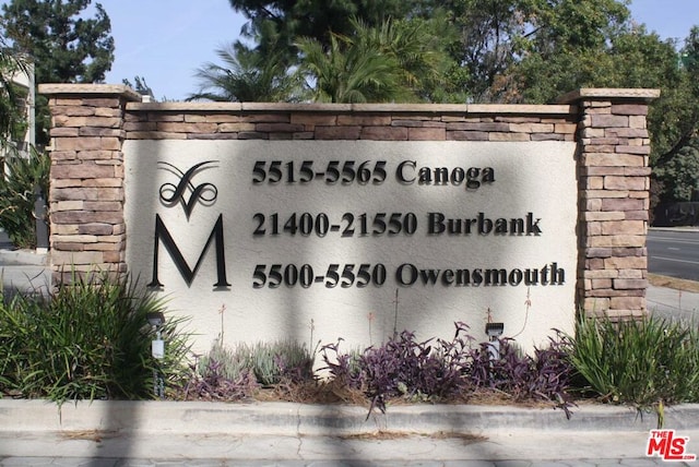 view of community sign