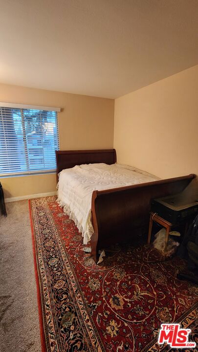 bedroom with carpet