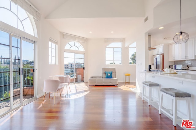 living area with light hardwood / wood-style floors