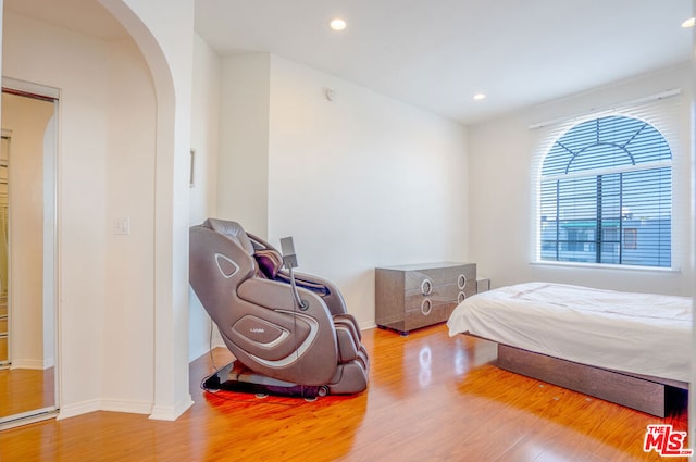 bedroom with light hardwood / wood-style floors