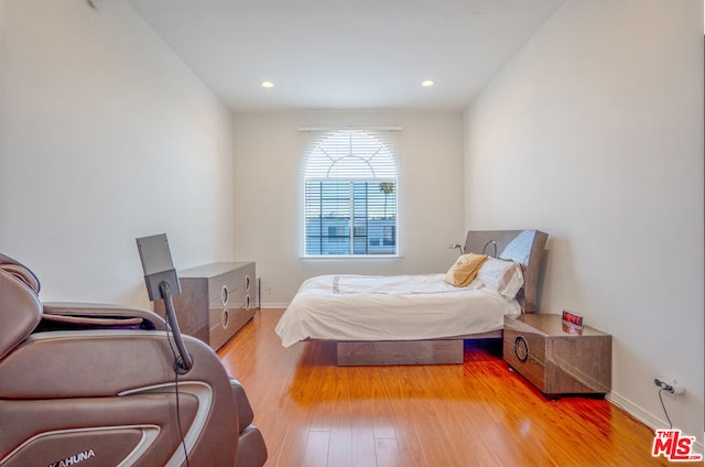 bedroom featuring light hardwood / wood-style floors