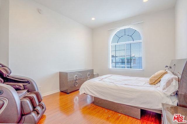 bedroom featuring light hardwood / wood-style flooring