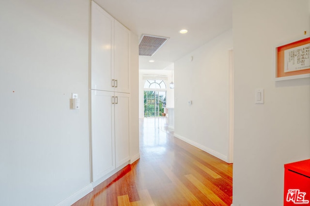 hallway featuring light hardwood / wood-style floors