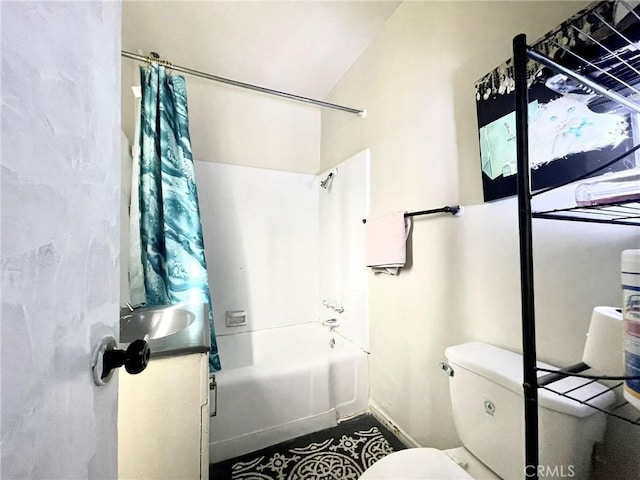 full bathroom featuring shower / bath combination with curtain, toilet, and vanity