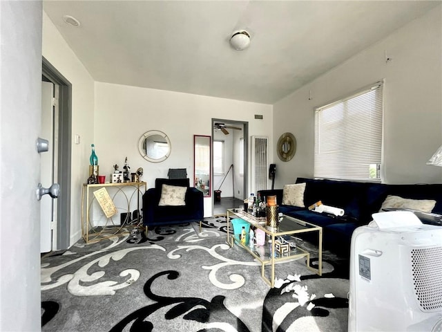 living room featuring ceiling fan