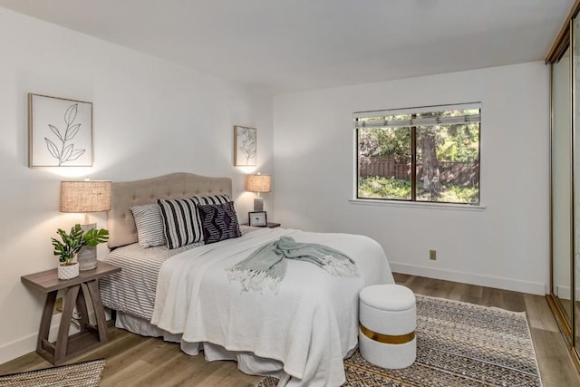 bedroom featuring wood-type flooring