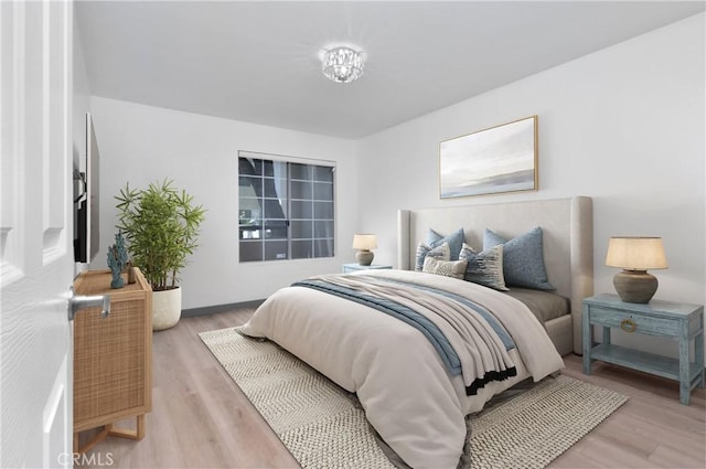 bedroom featuring hardwood / wood-style floors