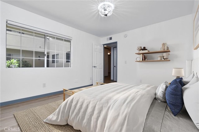 bedroom featuring light hardwood / wood-style flooring