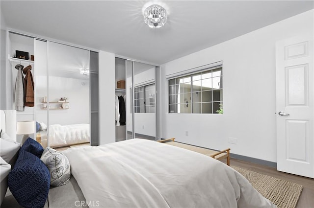 bedroom with hardwood / wood-style flooring