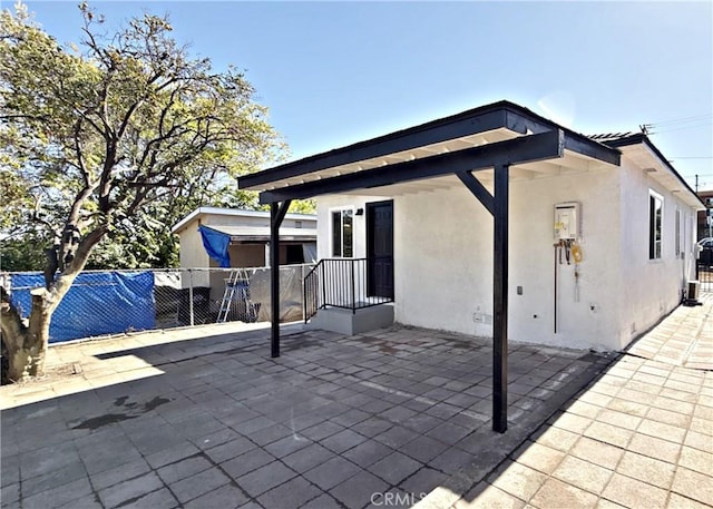 back of house featuring a patio area