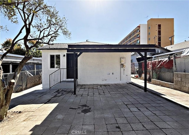 rear view of house with a patio area