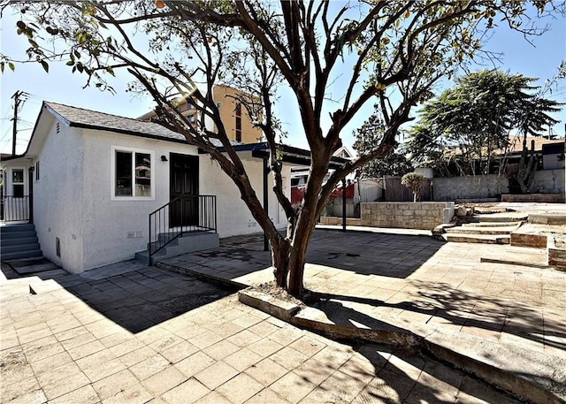 view of front facade with a patio