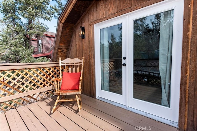 wooden terrace featuring french doors