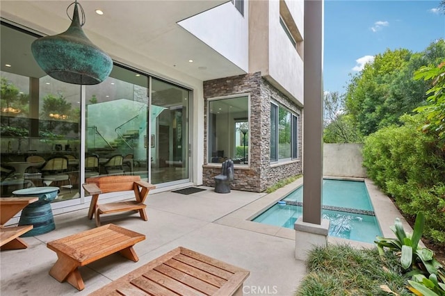 rear view of house with a patio area