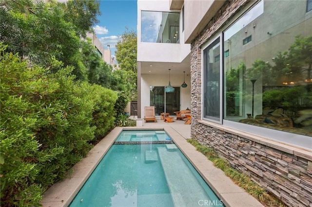 rear view of house featuring a patio