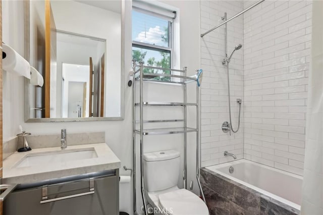 full bathroom with shower / bath combination with curtain, vanity, and toilet