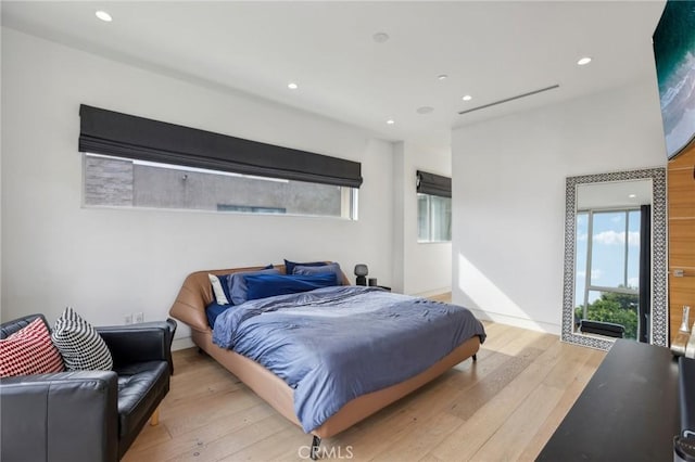 bedroom featuring light hardwood / wood-style flooring