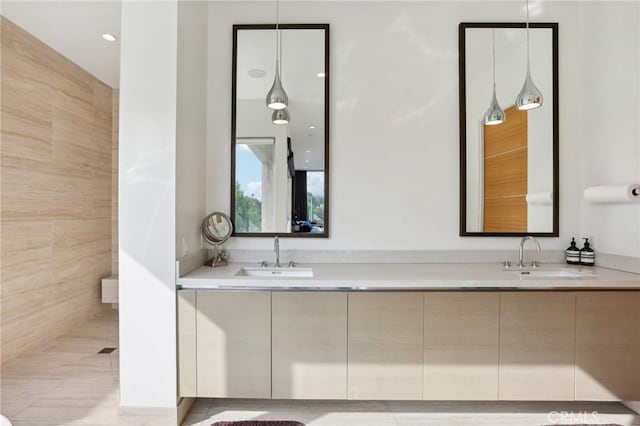 bathroom with vanity and tile patterned flooring