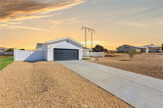 ranch-style house featuring a garage