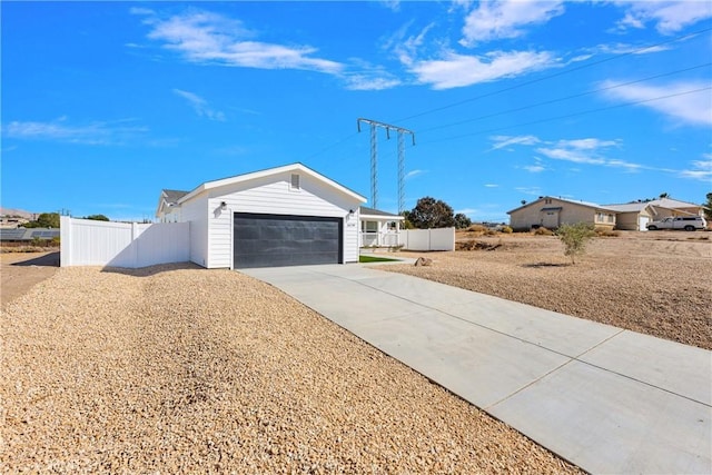 ranch-style home with a garage