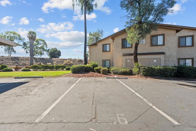 view of uncovered parking lot