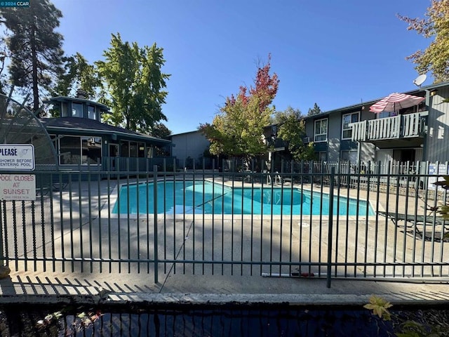 view of pool featuring a patio