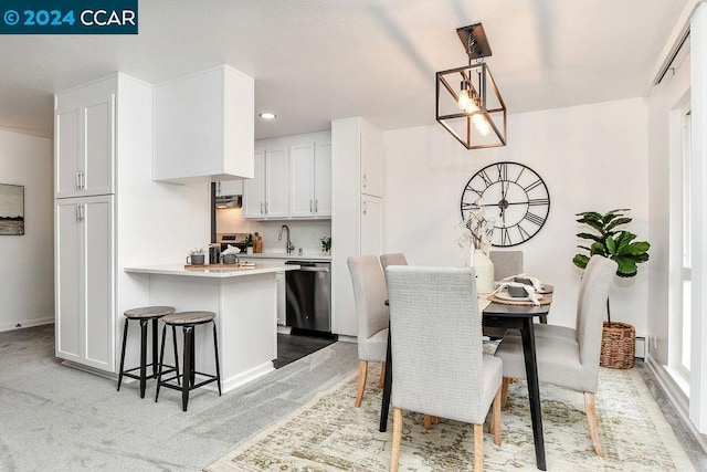 dining area featuring sink