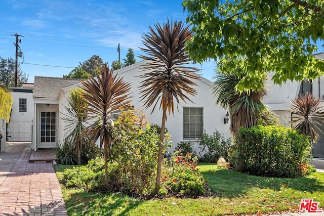 exterior space with a lawn