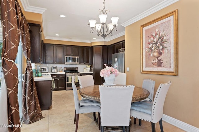 dining area with an inviting chandelier, light tile patterned floors, and crown molding