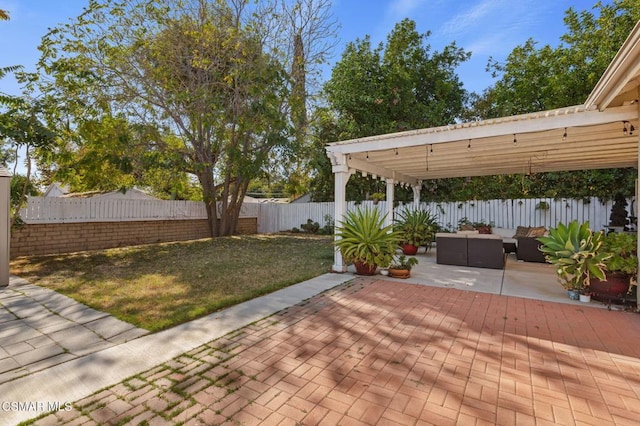 view of patio featuring an outdoor living space and a pergola