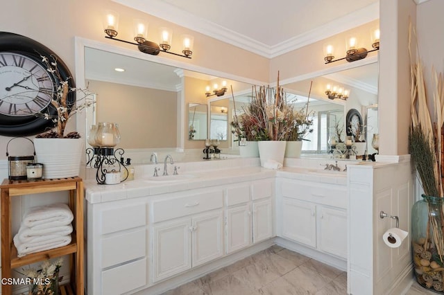 bathroom with vanity and ornamental molding