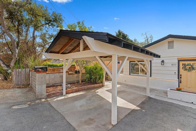 view of patio / terrace featuring a carport