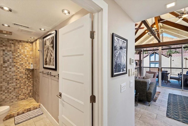 hallway with vaulted ceiling