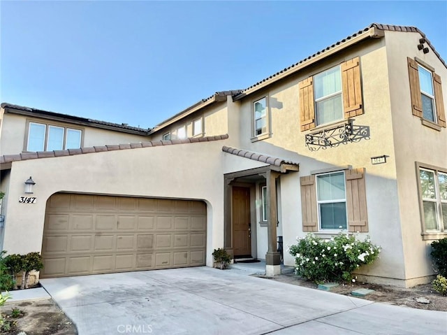 view of front of property with a garage