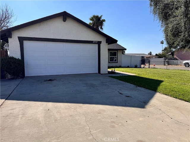 ranch-style house with a front yard and a garage